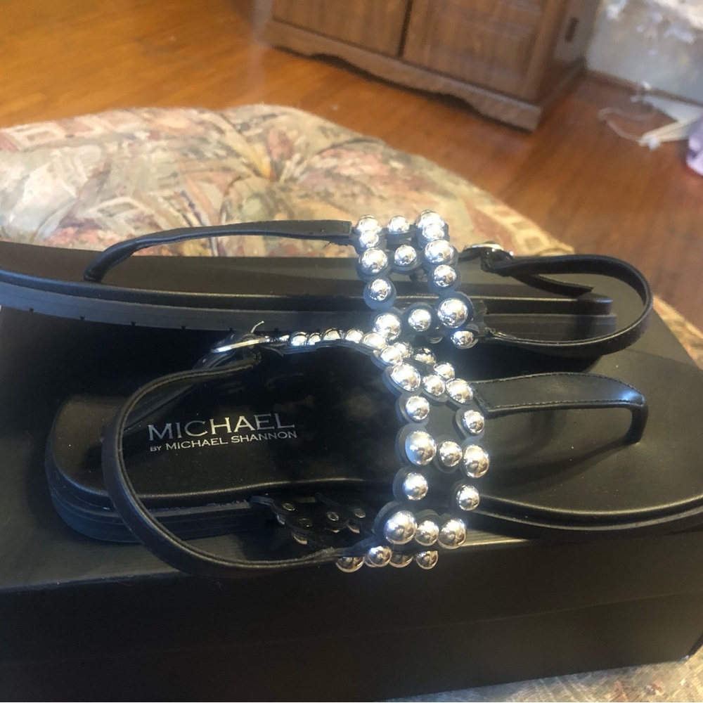 Black Women’s dress sandals size 9M, worn once,box included.